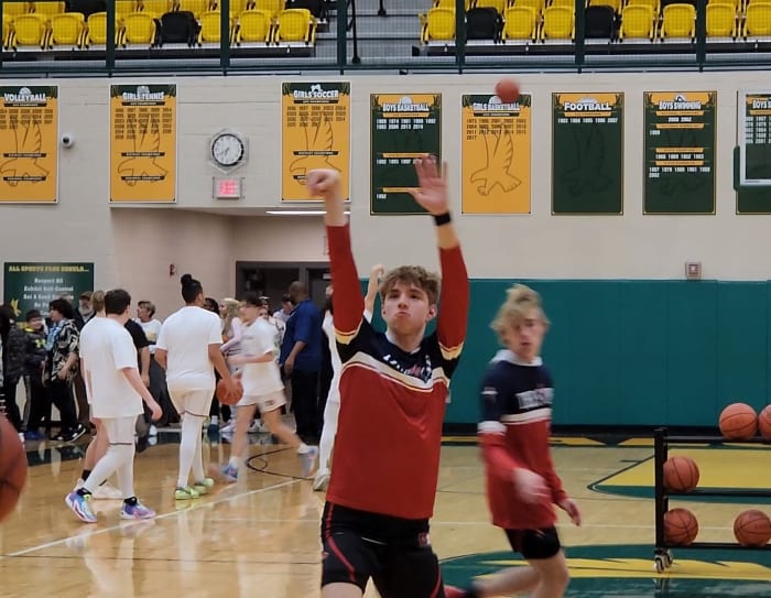 Cornerstone Christian Academy junior Quinn "Turtle" Kwasniak warms up before their district semifinal game against Fairport Harbor at Firestone High School in Akron on March 5, 2024.